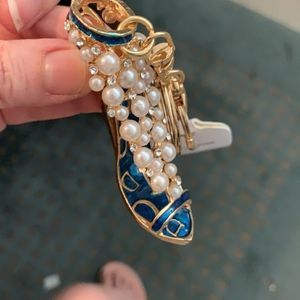 Beautiful high heel keychain with pearls. Brand-new.